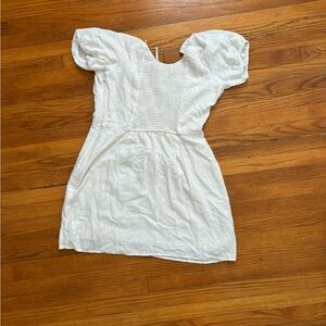 From Abercrombie and Fitch. It’s white and a large.